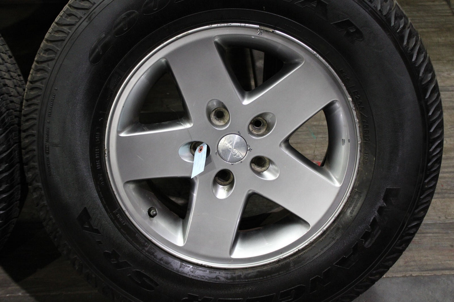 2007-2017 Jeep Wrangler 17x7.5" Wheel Set Goodyear 255/75R17 Light Damage Silver