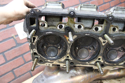 6.1L HEMI DODGE CHRYSLER JEEP DRIVER CYLINDER HEAD W EXHAUST MANIFOLD 05037369AA